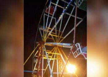 Accidente con heridos al desprenderse una silla del juego «La vuelta al mundo»