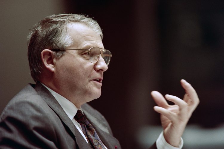 (FILES) In this file photo taken on December 2, 1992 AIDS co-discoverer professor Luc Montagnier attends a hearings of the commission of inquiry on Aids in Paris. - Rejected late in life for dubious theories, researcher Luc Montagnier, who died on February 8, 2022, will forever be associated with the discovery of the AIDS virus, that earned him the Nobel Prize for Medicine. (Photo by Eric Feferberg / AFP)