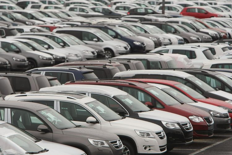 WOLFSBURG, GERMANY - NOVEMBER 14:  New VW cars wait to get loaded onto trucks at the Volkswagen car factory on November 14, 2008 in Wolfsburg, Germany. Many European carmakers are tightening their belts as consumers pull back from new car purchases in the face of the global financial crisis. The Organization for Economic Cooperation and Development, or OECD, reported that Germany has officially slid into recession after two consecutive quarters of negative growth.  (Photo by Sean Gallup/Getty Images)
