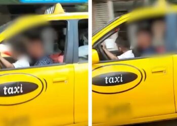 Grabaron a un taxista mientras manejaba con su hijo a upa y causó indignación