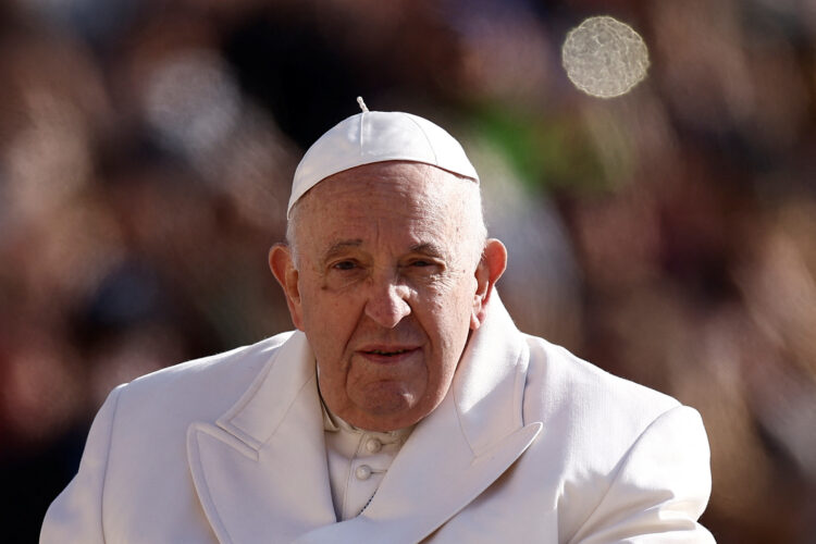 Pope Francis arrives for the weekly general audience in St. Peter's Square at the Vatican, March 29, 2023. REUTERS/Guglielmo Mangiapane