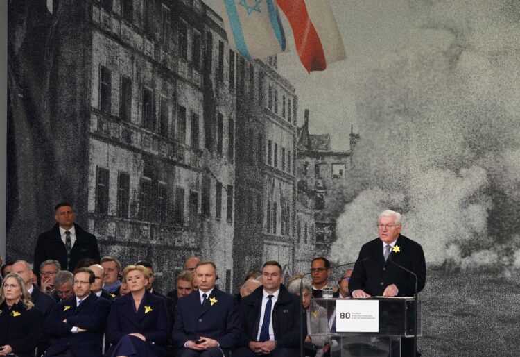 German President Frank-Walter Steinmeier (R) delivers a speech as the Israeli President's wife Michal Herzog (front row L), Israel's President Isaac Herzog (2ndL), Polish President Andrzej Duda (2nd R) and his wife Agata Kornhauser-Duda (2ndR) listen during the central commemoration ceremony of the 80th anniversary of the start of the Warsaw Jewish Ghetto Uprising, in Warsaw, Poland on April 19, 2023. - Poland will mark 80 years since the Warsaw Ghetto Uprising, when hundreds of Jews launched a doomed attack against the Nazis, with the commemorations looking beyond the fighters and emphasising the civilian experience. The presidents of Germany and Israel will join their Polish counterpart for the anniversary of the month-long revolt, which was the largest single act of Jewish resistance against the Germans during World War II. (Photo by JANEK SKARZYNSKI / AFP)