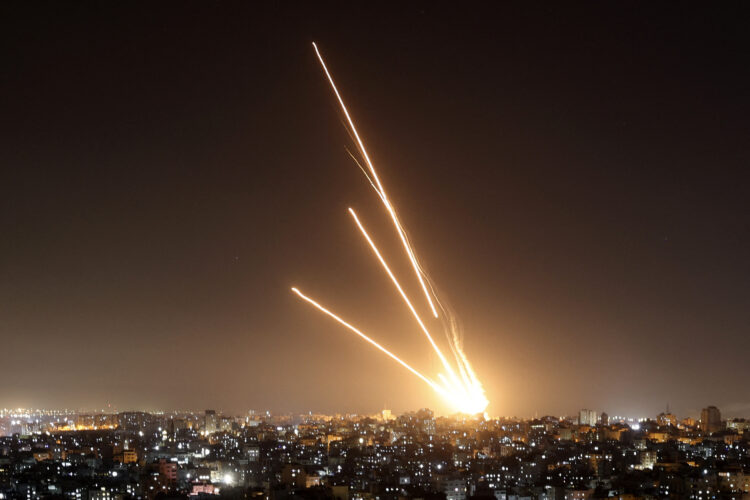 Rockets are fired from Gaza City toward Israel, on May 10, 2023. Israel's army and Gaza militants traded heavy cross-border fire on May 10, with 22 Palestinians killed over two days amid the worst escalation of violence to hit the coastal territory in months. (Photo by MAHMUD HAMS / AFP)