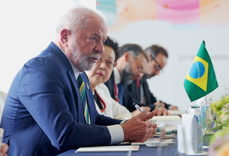 Brazil's President Luiz Inacio Lula da Silva (L) speaks with Japan's Prime Minister Fumio Kishida (not pictured) during their bilateral meeting on the sidelines of the G7 Summit Leaders' Meeting in Hiroshima on May 20, 2023. (Photo by JAPAN POOL / POOL / AFP) / - Japan OUT - NO Resale