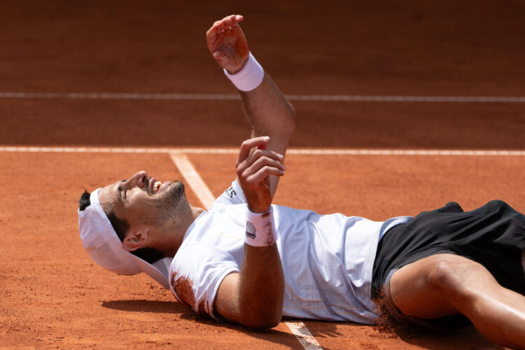 Argentina's Pedro Cachin reacts after winning his final match against Spain's Albert Ramos-Vinolas at the Swiss Open tennis tournament in Gstaad, southwestern Switzerland, on July 23, 2023. (Photo by Fabrice COFFRINI / AFP)