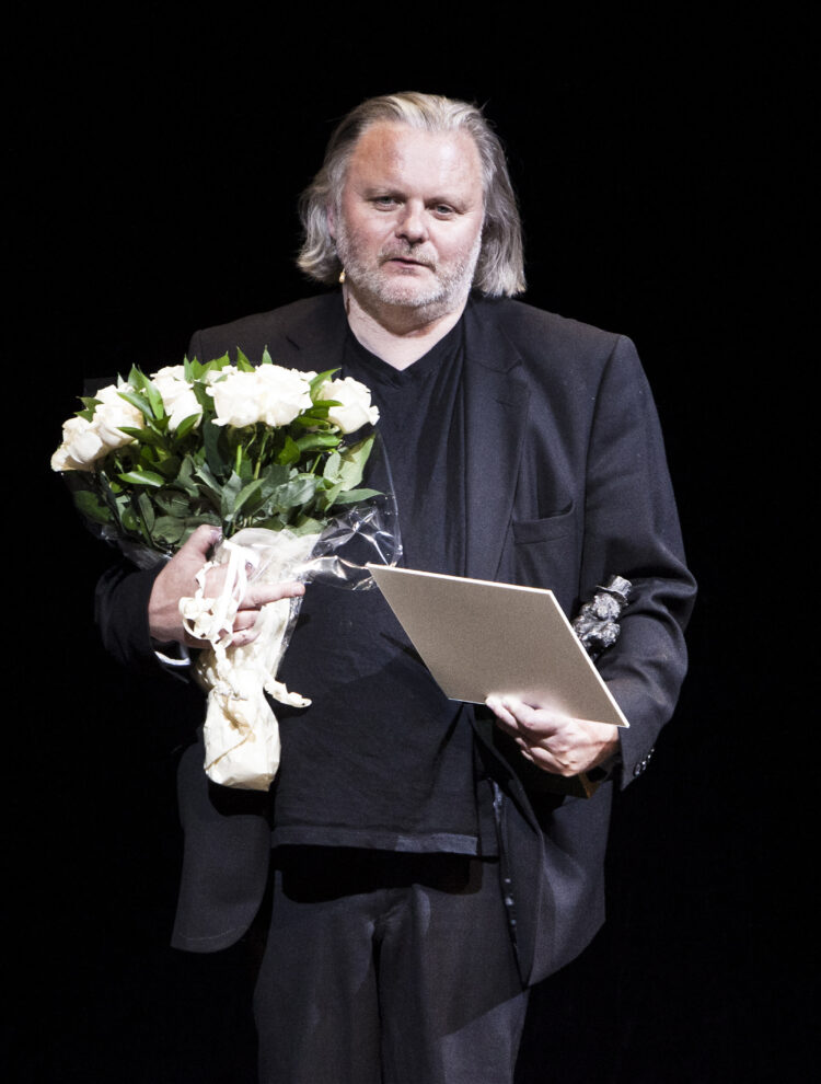 (Files) Norwegian dramatist Jon Fosse receives the Ibsen Prize from Juror Eirik Stuboe during the Ibsen Festival at the National Theatre in Oslo on September 10, 2010. The Swedish Academy on October 5, 2023 awarded the Nobel literature prize to Norwegian playwright Jon Fosse, whose plays are among the most widely staged of any contemporary playwright in Europe. (Photo by SCANPIX NORWAY / AFP)