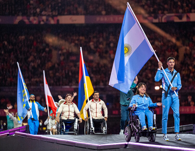 Flag bearers Stefania Ferrando ARG and Brian Lionel Impellizzeri ARG make their way into the Stade de France for the Parade of the Flags of the Nations during the Closing Ceremony at the Paris 2024 Paralympic Games, Paris, France. Sunday 8 September 2024. Photo: OIS/Joel Marklund. Handout image supplied by OIS/IOC