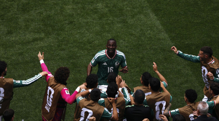 (260612) -- MEXICO CITY, June 12, 2026 (Xinhua) -- Julian Quinones (up) of Mexico celebrates scoring with teammates during the group A match between Mexico and South Africa at the 2026 FIFA World Cup at Mexico City Stadium in Mexico City, Mexico, June 11, 2026. (Photo by Francisco Canedo/Xinhua)