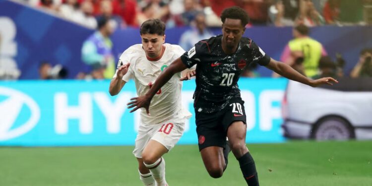 Soccer Football - FIFA World Cup 2026 - Round of 16 - Canada v Morocco - Houston Stadium, Houston, Texas, U.S. - July 4, 2026 Canada's Ali Ahmed in action with Morocco's Brahim Diaz IMAGN IMAGES via Reuters/Troy Taormina.